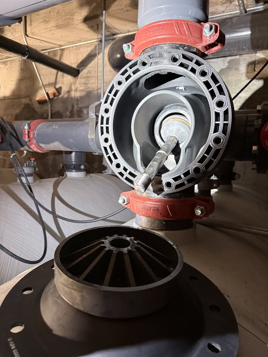 Circulation pump opened up for impeller and coupling service